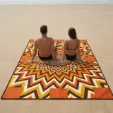 Helios Oversized Blanket next to an adult for size