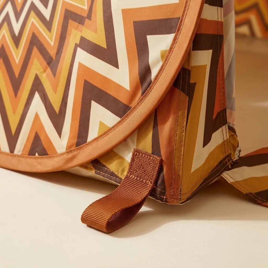 Helios Pop-Up Beach Tent, close-up of the print and stitching