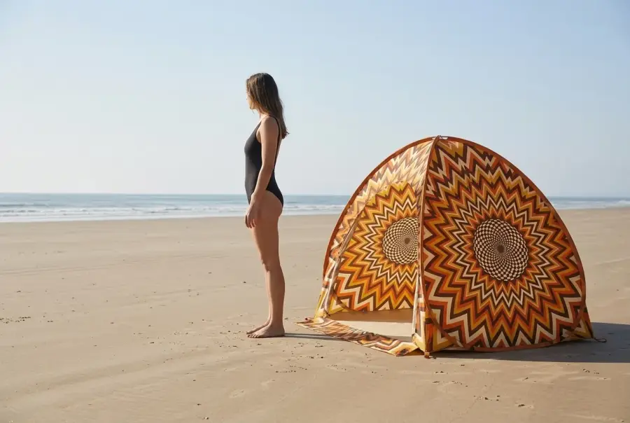 Helios Pop-Up Beach Tent next to an adult for size