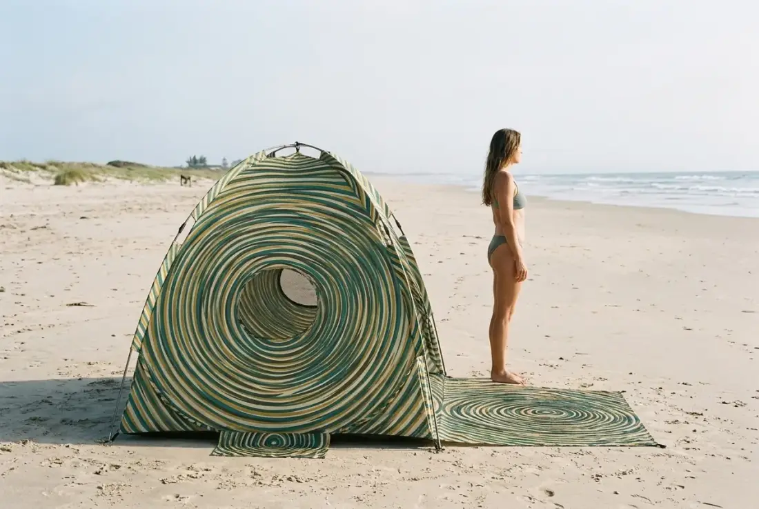 Ripple Beach Shelter next to an adult for size