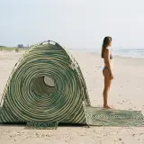 Ripple Beach Shelter next to an adult for size