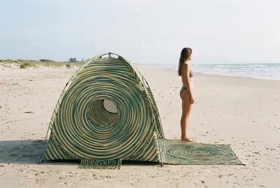 Ripple Beach Shelter next to an adult for size