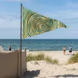 Ripple Pennant Flag set up on the beach