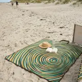 Ripple Roll-Up Mat set up on the beach
