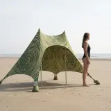 Ripple Stretch Shade next to an adult for size