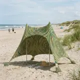 Ripple Stretch Shade set up on the beach