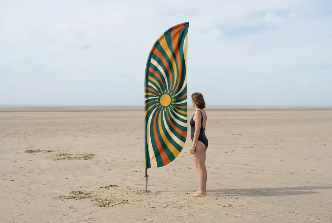 Spiral Feather Flag next to an adult for size