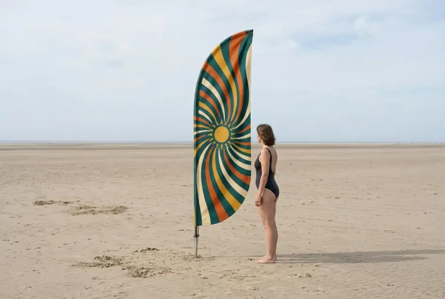 Spiral Feather Flag next to an adult for size