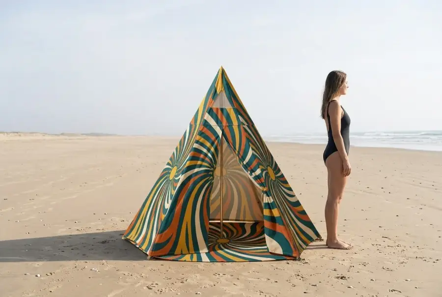 Spiral Tipi Shade next to an adult for size