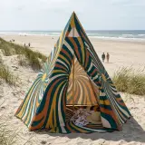 Spiral Tipi Shade set up on the beach