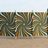 Spiral Windbreak, 4 Poles next to an adult for size