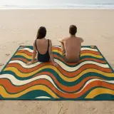 Swell Beach Blanket next to an adult for size
