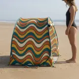Swell Pop-Up Tent next to an adult for size