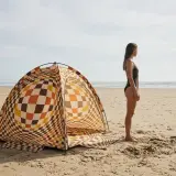 Warp Beach Shelter next to an adult for size